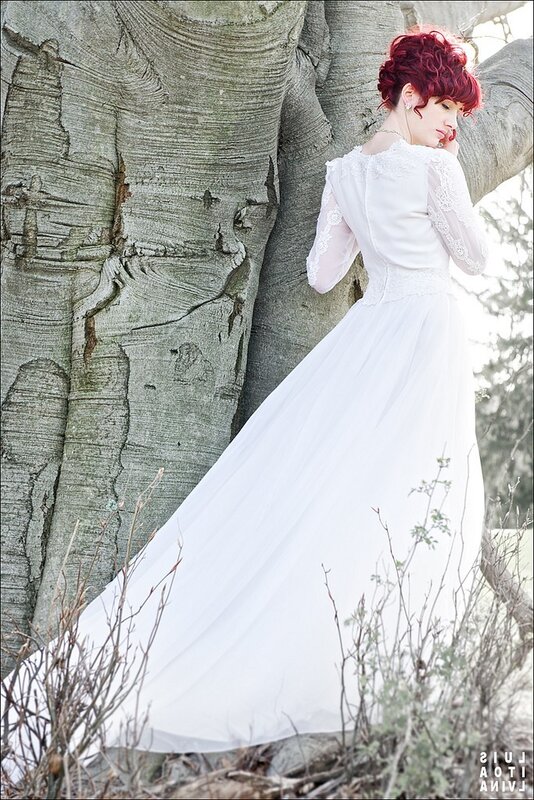 woman in white dress by tree