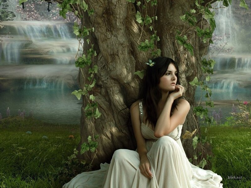 woman in white dress by tree