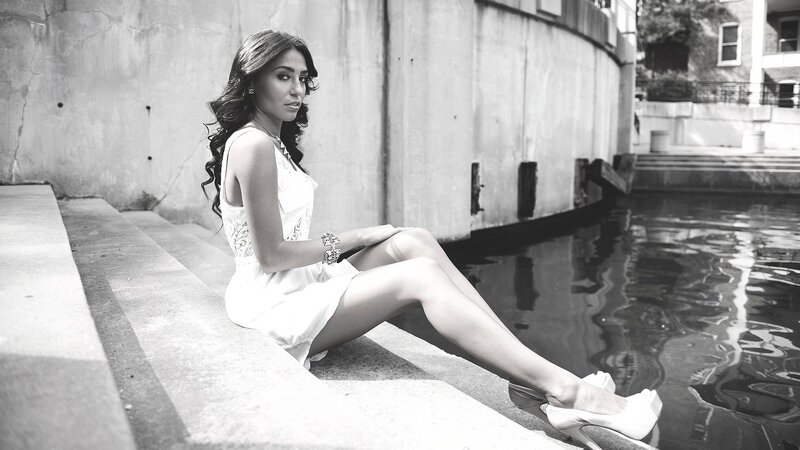 woman in white dress by water