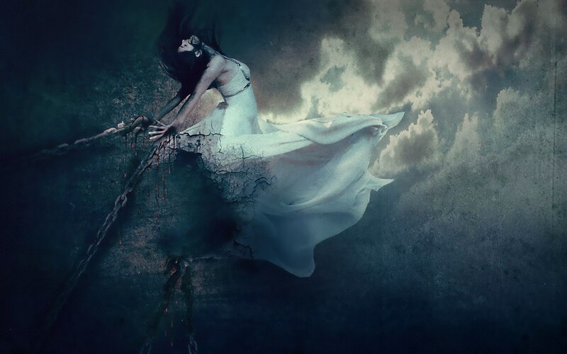 woman in white dress chained