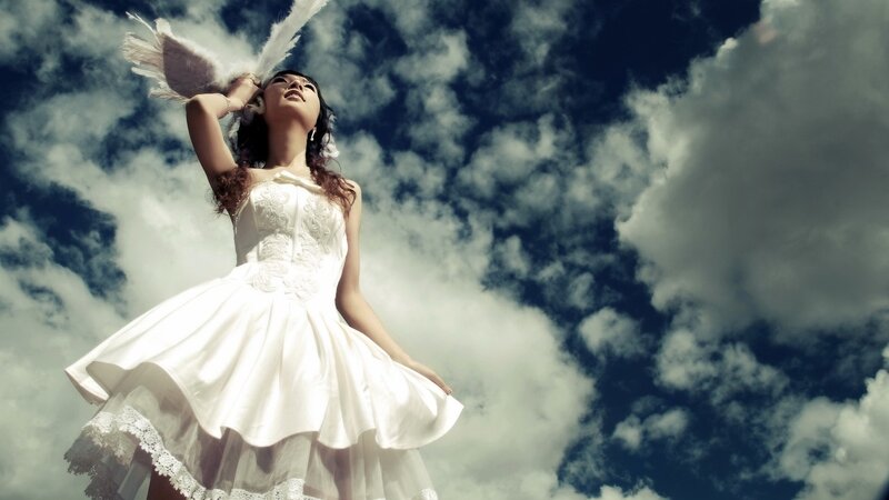 Woman in White Dress — Dramatic, Afternoon, Photograph, Bird, Clouds