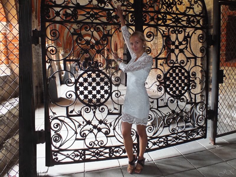 Woman in White Dress — Dramatic, Afternoon, Photograph, Iron Gate