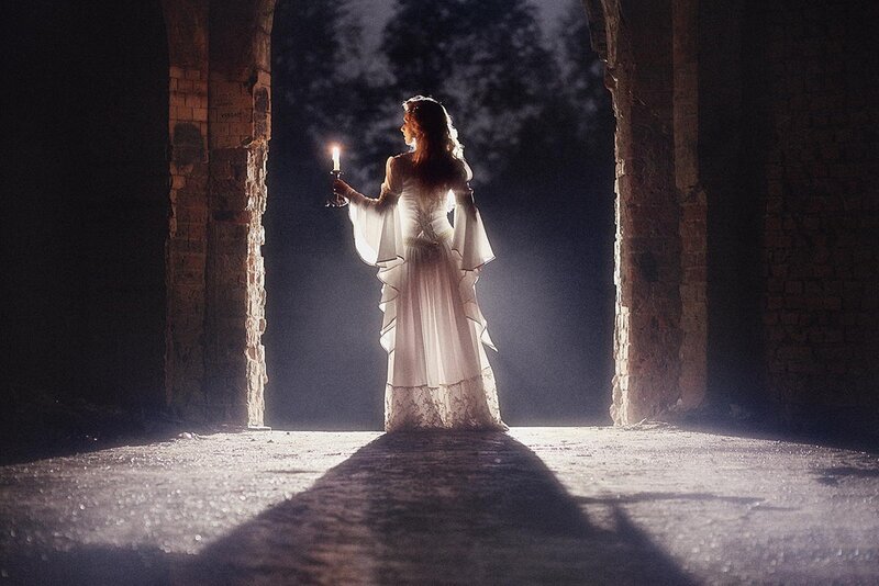 Woman in White Dress — Dramatic, Night, Photograph, Candle