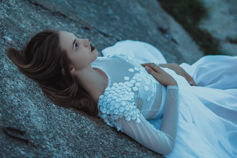 Woman in White Dress — Dramatic, Night, Photograph, Rock