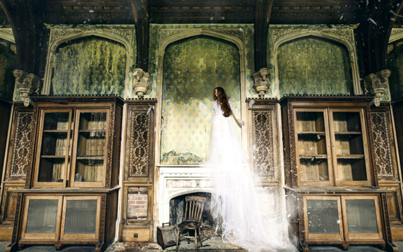 Woman in White Dress — Dramatic, Photograph, Fireplace, Bookcases