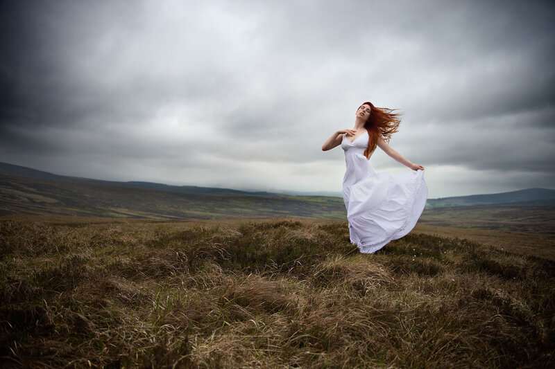 Woman in White Dress — Dramatic, Photograph, Grassland