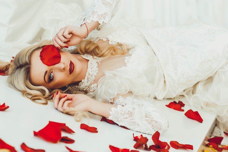 Woman in White Dress — Dramatic, Photograph, Rose Petals, Lace Dress