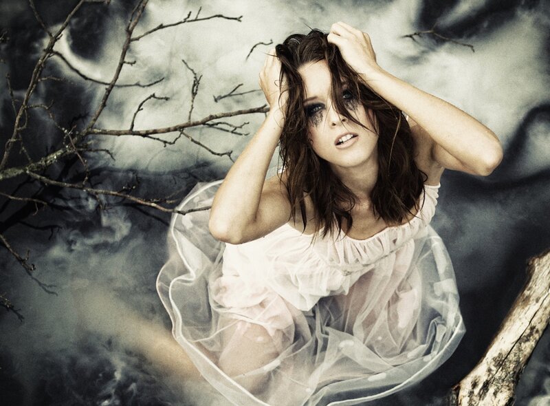 Woman in White Dress — Dramatic, Photograph, Tree Branches