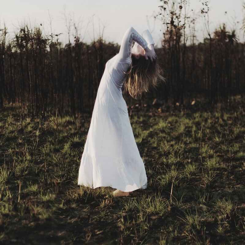 Woman in White Dress — Dramatic, Sunset, Photograph, Field
