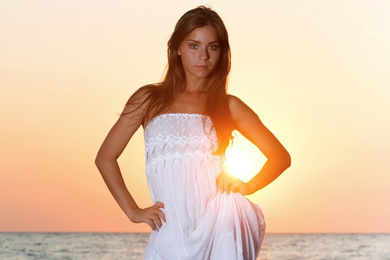 Woman in White Dress — Dramatic, Sunset, Photograph, Ocean, Orange