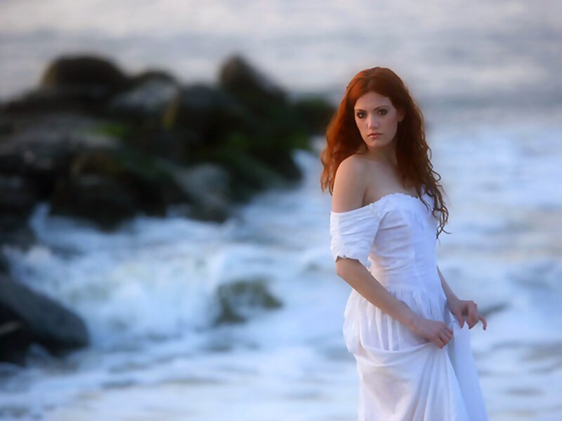 Woman in White Dress — Dramatic, Sunset, Photograph, Ocean, Rocks