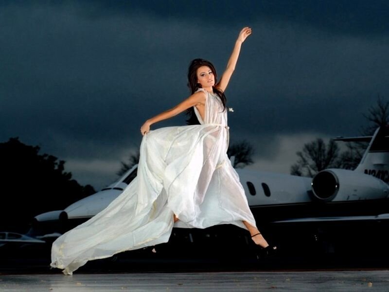 Woman in White Dress — Dramatic