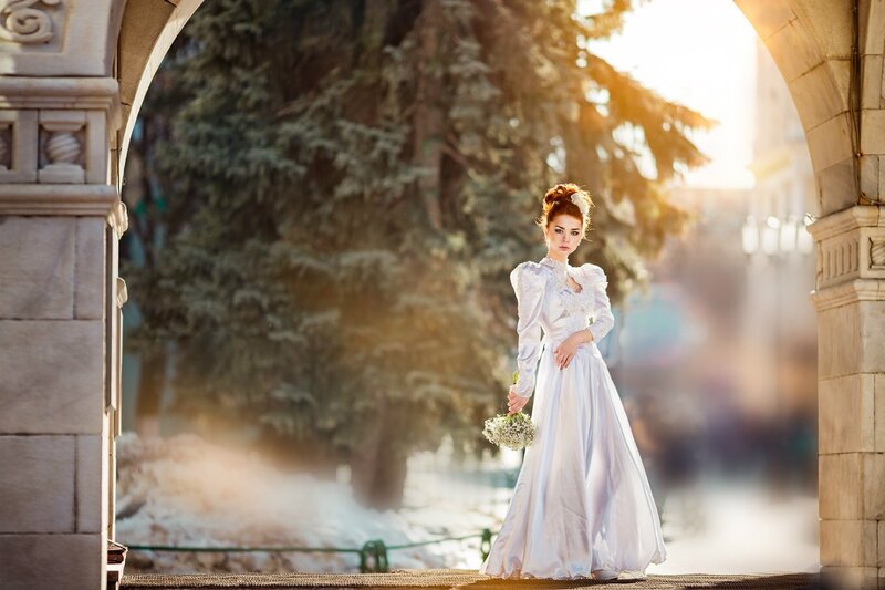 Woman in White Dress — Dramatic, Winter, Photograph, Archway