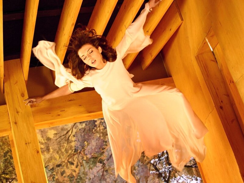 woman in white dress floating