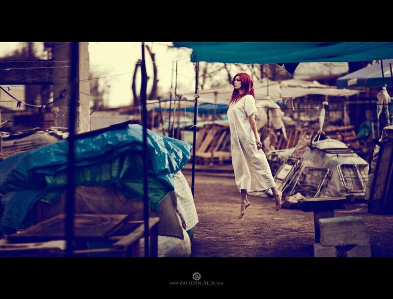 Woman in white dress floating