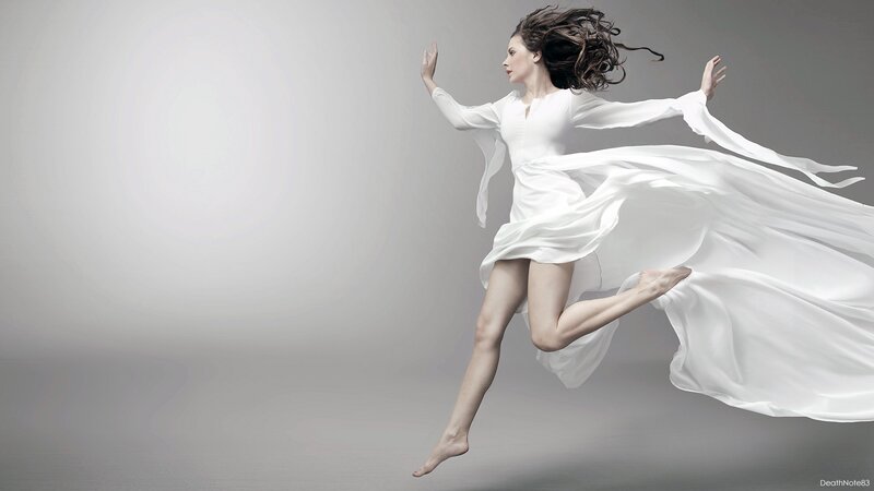 woman in white dress floating