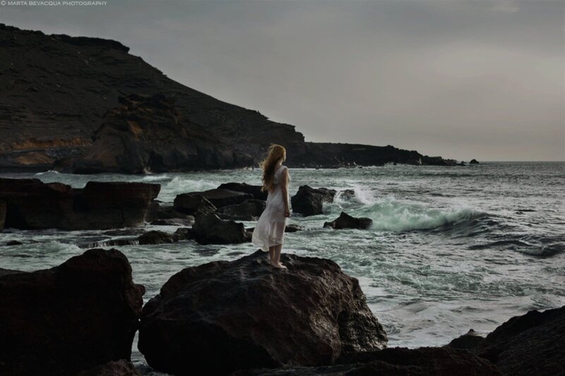 Woman in White Dress — Gray, Dramatic, Sunset, Photograph, Ocean