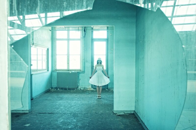 woman in white dress in abandoned building