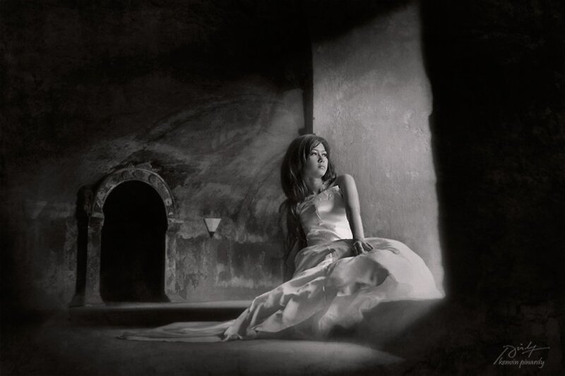 woman in white dress in dark room