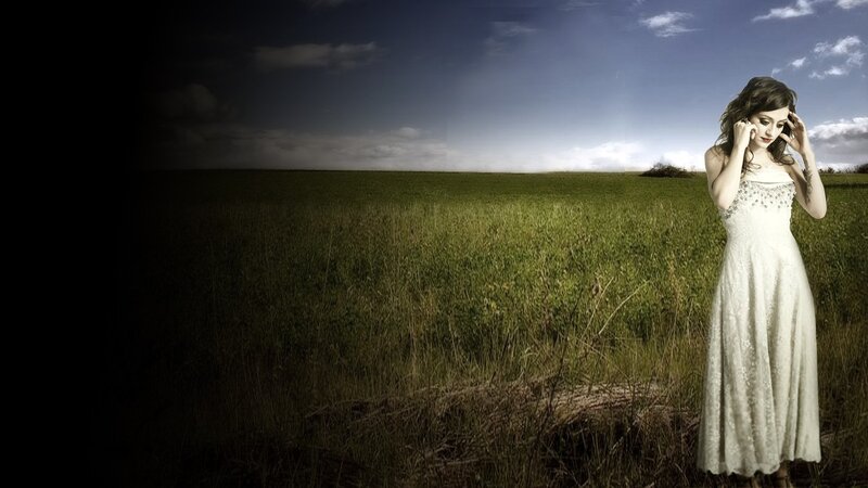 woman in white dress in field