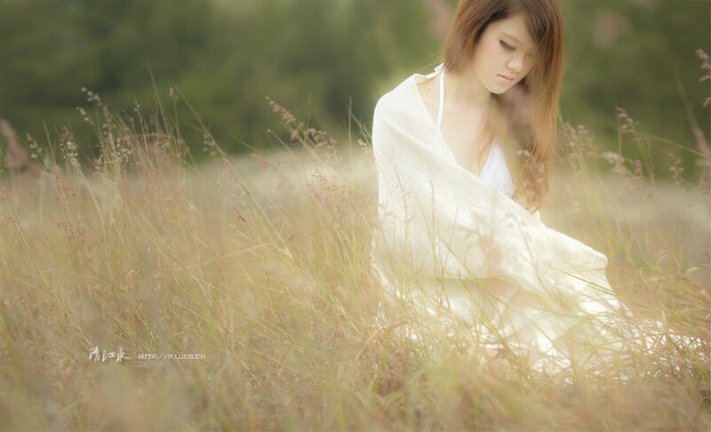 woman in white dress in field