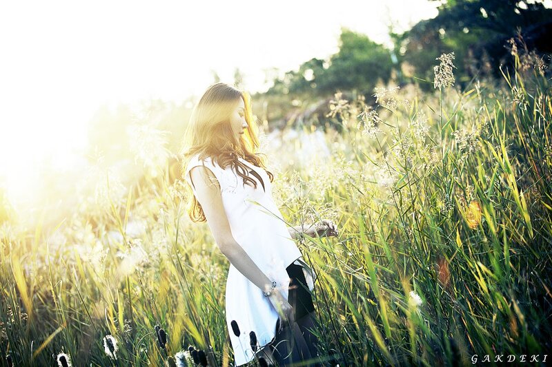 woman in white dress in field