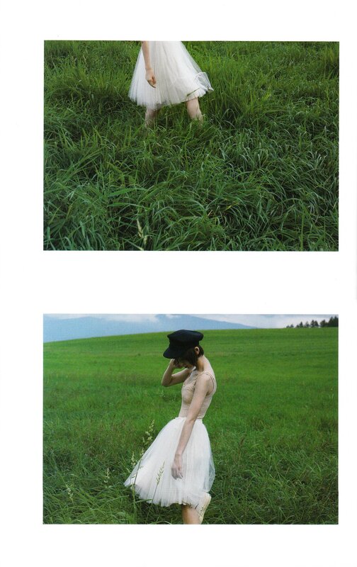 woman in white dress in field