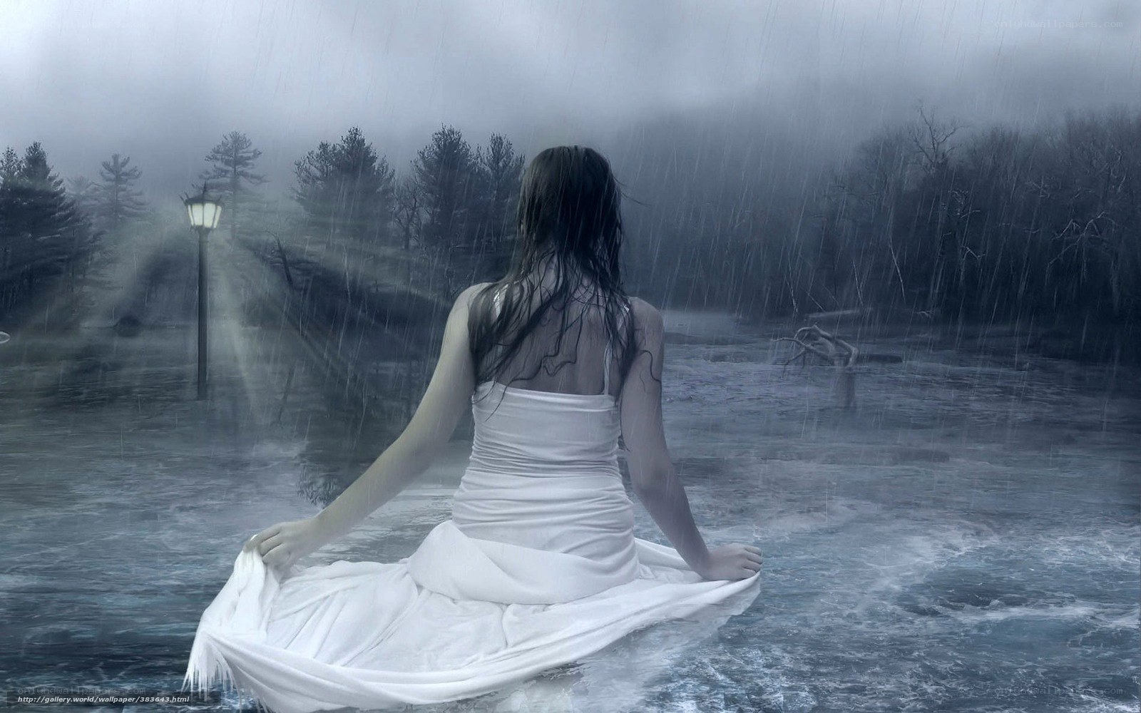 woman in white dress in rain