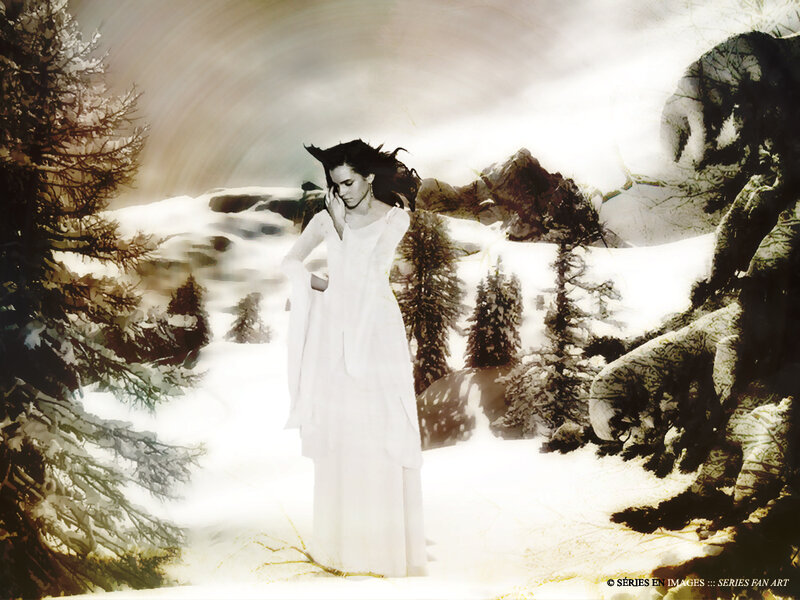 woman in white dress in snowy landscape