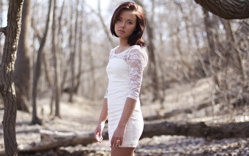 woman in white dress in woods
