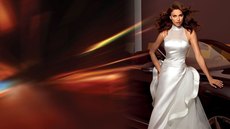 woman in white dress near car