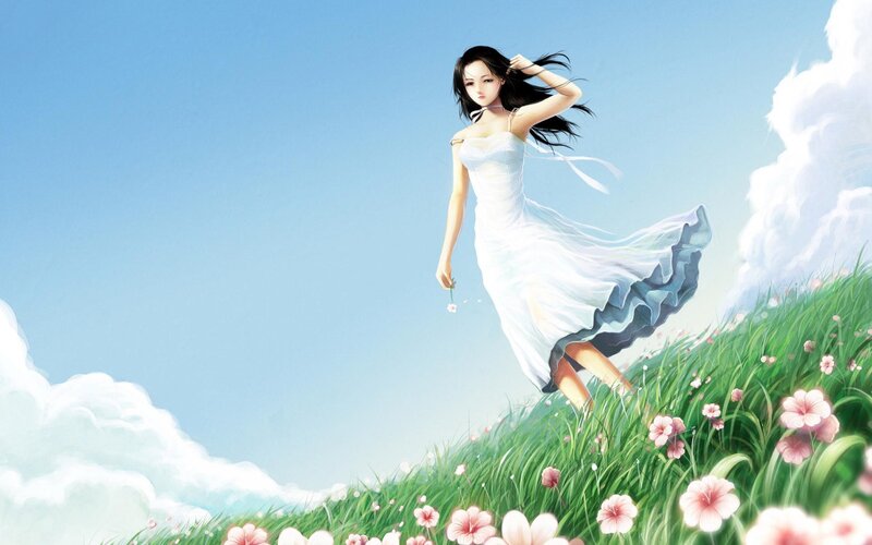 Woman in white dress on a hill