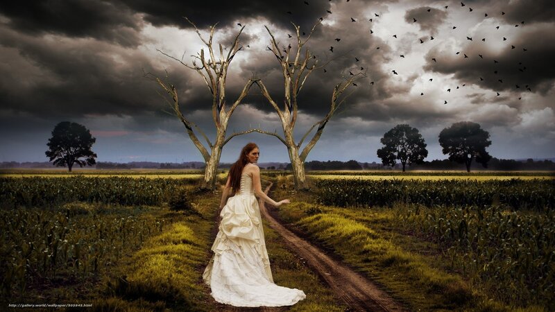 Woman in white dress on a path