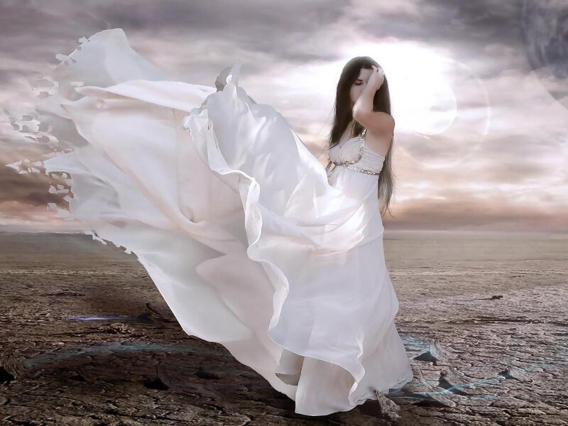 woman in white dress on barren land