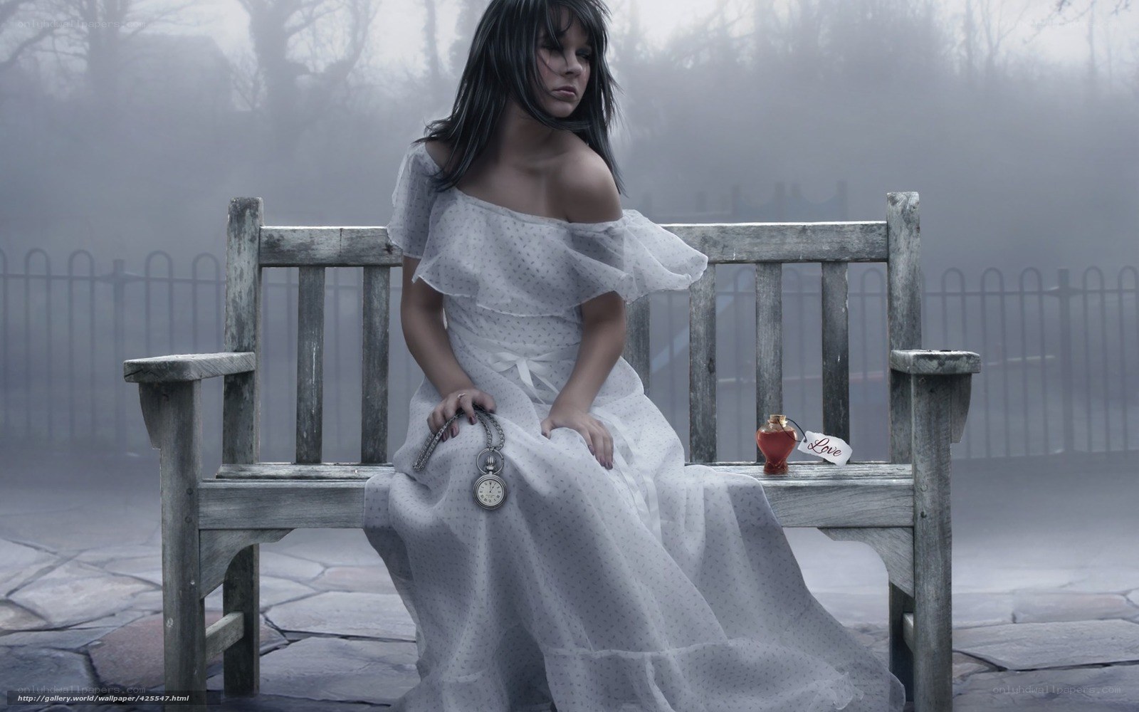 woman in white dress on bench