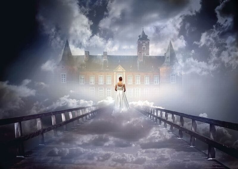 woman in white dress on bridge