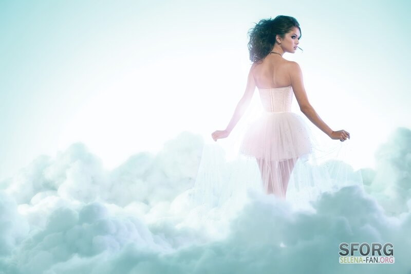 woman in white dress on clouds