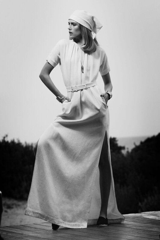 woman in white dress on deck