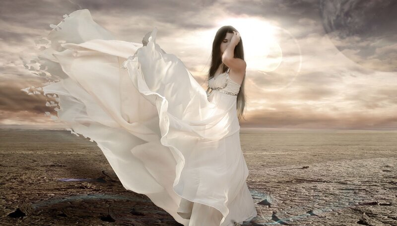 woman in white dress on desert
