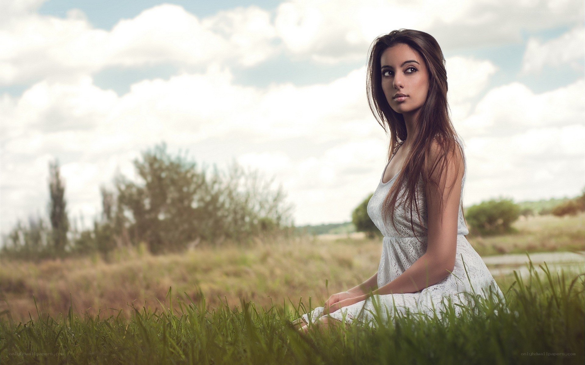 woman in white dress on grass