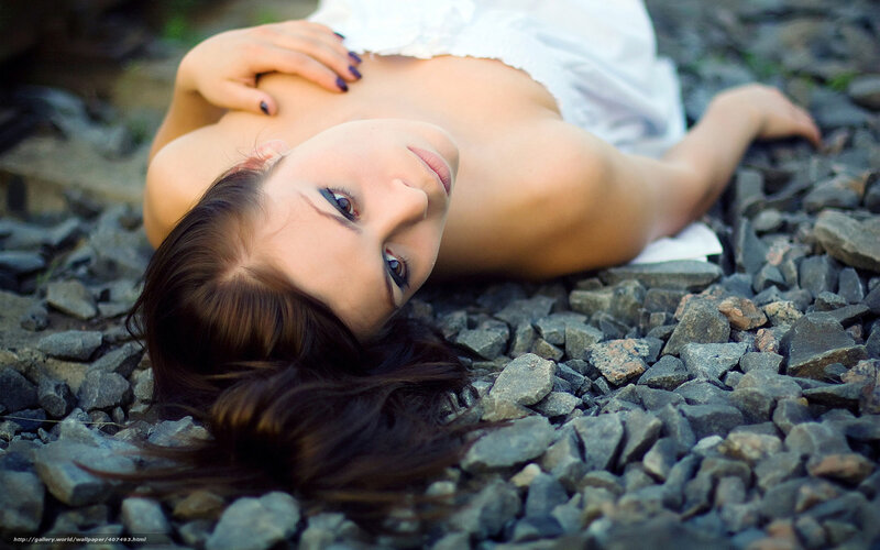 woman in white dress on gravel