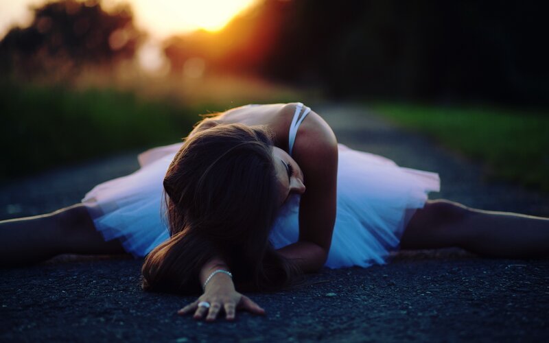 woman in white dress on ground