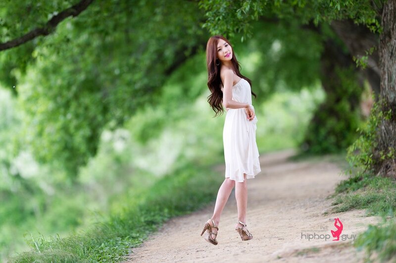 Woman in white dress on path