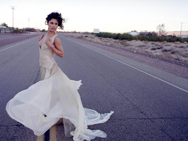 woman in white dress on road