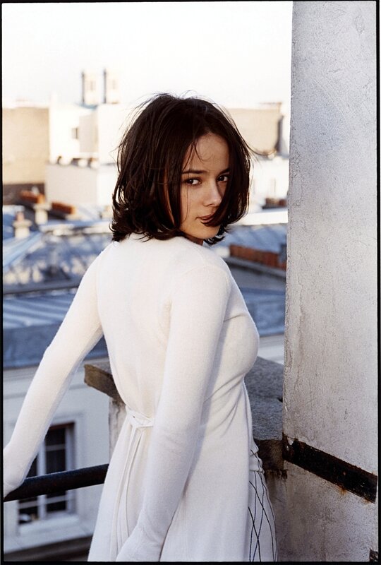 woman in white dress on rooftop