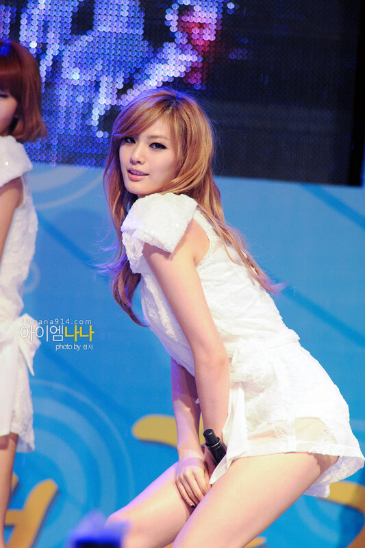 woman in white dress on stage