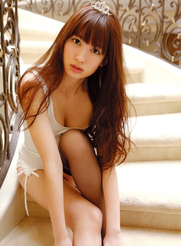 woman in white dress on stairs