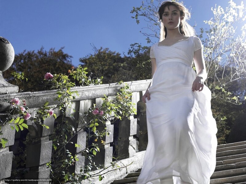 woman in white dress on stairs