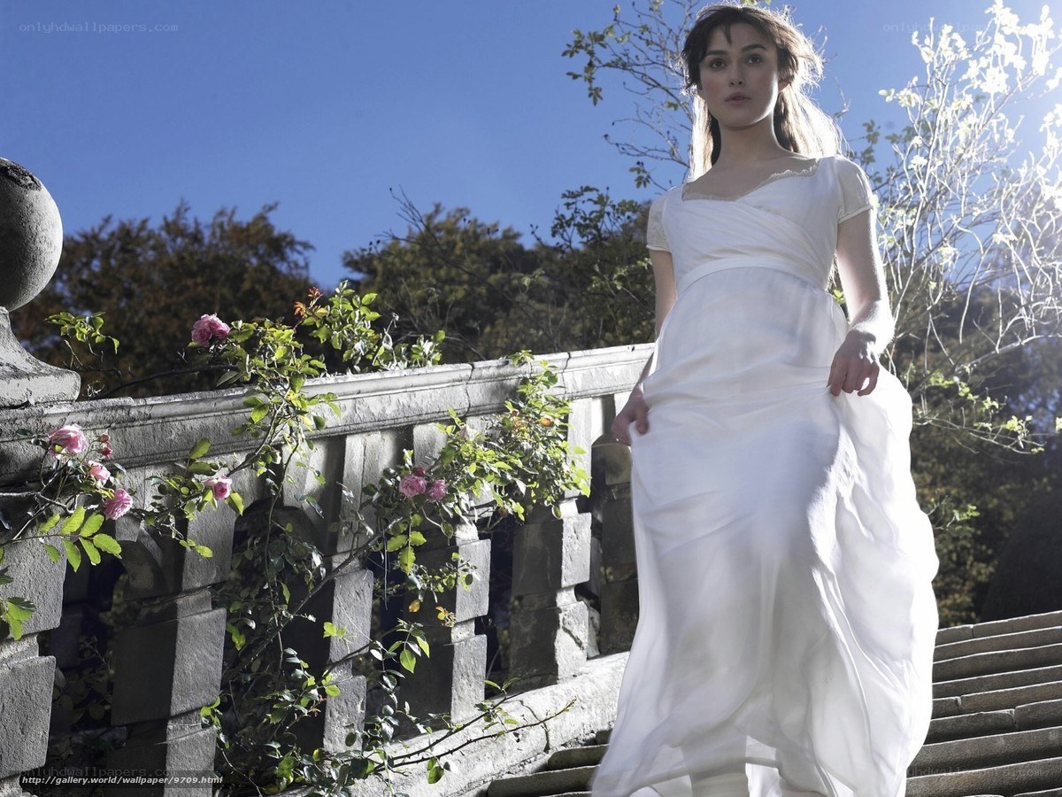 woman in white dress on stairs
