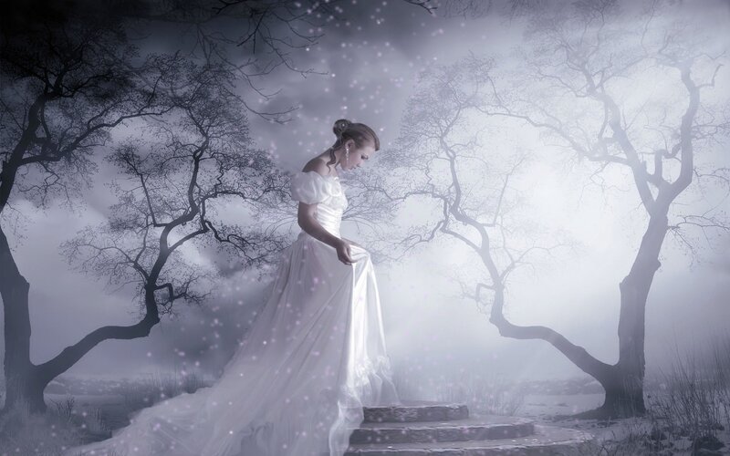 woman in white dress on steps